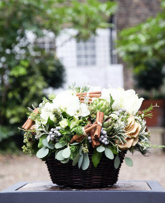 Christmas basket full of white anemones